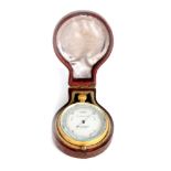 AITCHISON, LONDON. AN EARLY 20TH CENTURY CASED POCKET BAROMETER the gilt case enclosing a silvered