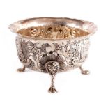 AN EARLY 20TH CENTURY IRISH SILVER SUGAR BOWL the body with embossed decoration depicting a fox