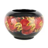 A 20TH CENTURY MOORCROFT STYLE OVERSIZED BULBOUS JARDINIERE WITH INWARD CURVED RIM tube lined and