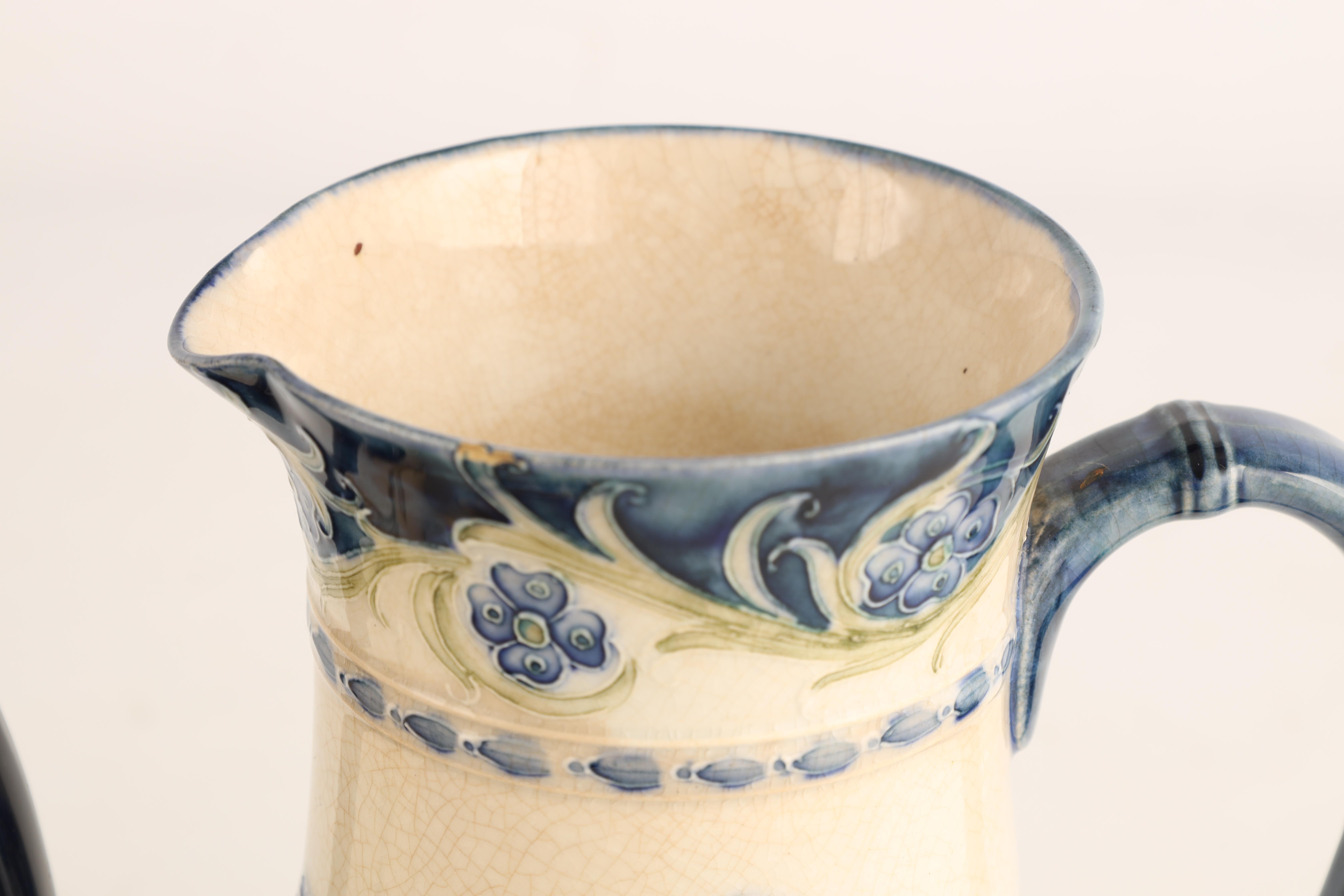 A JAMES MACINTYRE AND CO BURSLEM BULBOUS JUG tube lined and decorated in the blue poppy pattern - Image 5 of 9