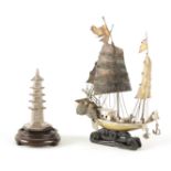 TWO 19TH CENTURY CHINESE SILVER MODELS comprising a pagoda-shaped tower on a hardwood base 13.5cm
