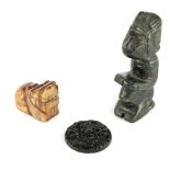 A CHINESE RUSETT JADE CARVING OF A FOO DOG 5cm wide A SPINACH GREEN FIGURE 11.5cm high and A