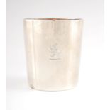 A GEORGE III SILVER BEAKER with gilt interior and coat of arms to the front, London 1802 9cm high