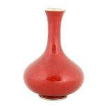 A MINIATURE JAPANESE MEIJI PERIOD RED ENAMELLED SILVER VASE with bulbous body and slender neck 9cm