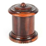 A 19TH CENTURY LIGNUM VITAE CYLINDRICAL STRING BOX of good colour and patina with incised screw-on