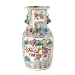 A 19TH CENTURY CHINESE CANTON VASE decorated with fighting warriors surrounded by flowers and