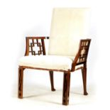 A 19TH CENTURY CHIPPENDALE STYLE UPHOLSTERED MAHOGANY ARMCHAIR