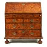 AN UNUSUAL WILLIAM AND MARY HERRING BANDED MULBERRY VENEERED BUREAU