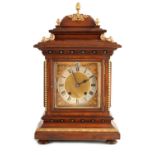 A LATE 19TH CENTURY GERMAN WALNUT ORMOLU MOUNTED BRACKET CLOCK