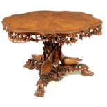 A FINE EARLY 19TH CENTURY CONTINENTAL FIGURED WALNUT CARVED CENTRE TABLE