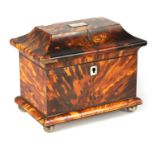 AN EARLY 19TH CENTURY BLONDE TORTOISESHELL TEA CADDY