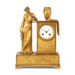 AN EARLY 19TH CENTURY FRENCH FIGURAL ORMOLU MANTEL CLOCK