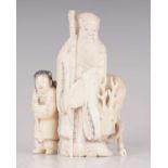 A FINELY CARVED CHINESE IVORY SCULPTURE