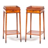 A PAIR OF 19TH CENTURY SHERATON STYLE PAINTED SATINWOOD URN STANDS