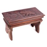 AN EARLY 20TH CENTURY CARVED BLACK FOREST MUSICAL CHILDS FOLDING TABLE