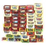 A LARGE COLLECTION OF MATCHBOX MODELS OF YESTERYEARS ADVERTISING COMMERCIAL VEHICLES AND TAXIS