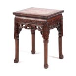 A 19TH CENTURY CHINESE HARDWOOD SQUARE JARDINIERE STAND
