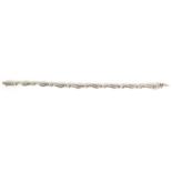 A LADIES 18CT WHITE GOLD DIAMOND ENCRUSTED BRACELET