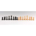 A TOURNAMENT SIZE STAUNTON TYPE WEIGHTED CHESS SET