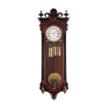 A 19TH CENTURY TRIPLE WEIGHT QUARTER CHIMING VIENNA WALL CLOCK