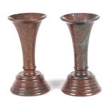 A PAIR OF 19TH CENTURY RED SERPENTINE MARBLE VASES