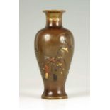 A MEIJI PERIOD JAPANESE PATINATED BRONZE MIXED METAL VASE