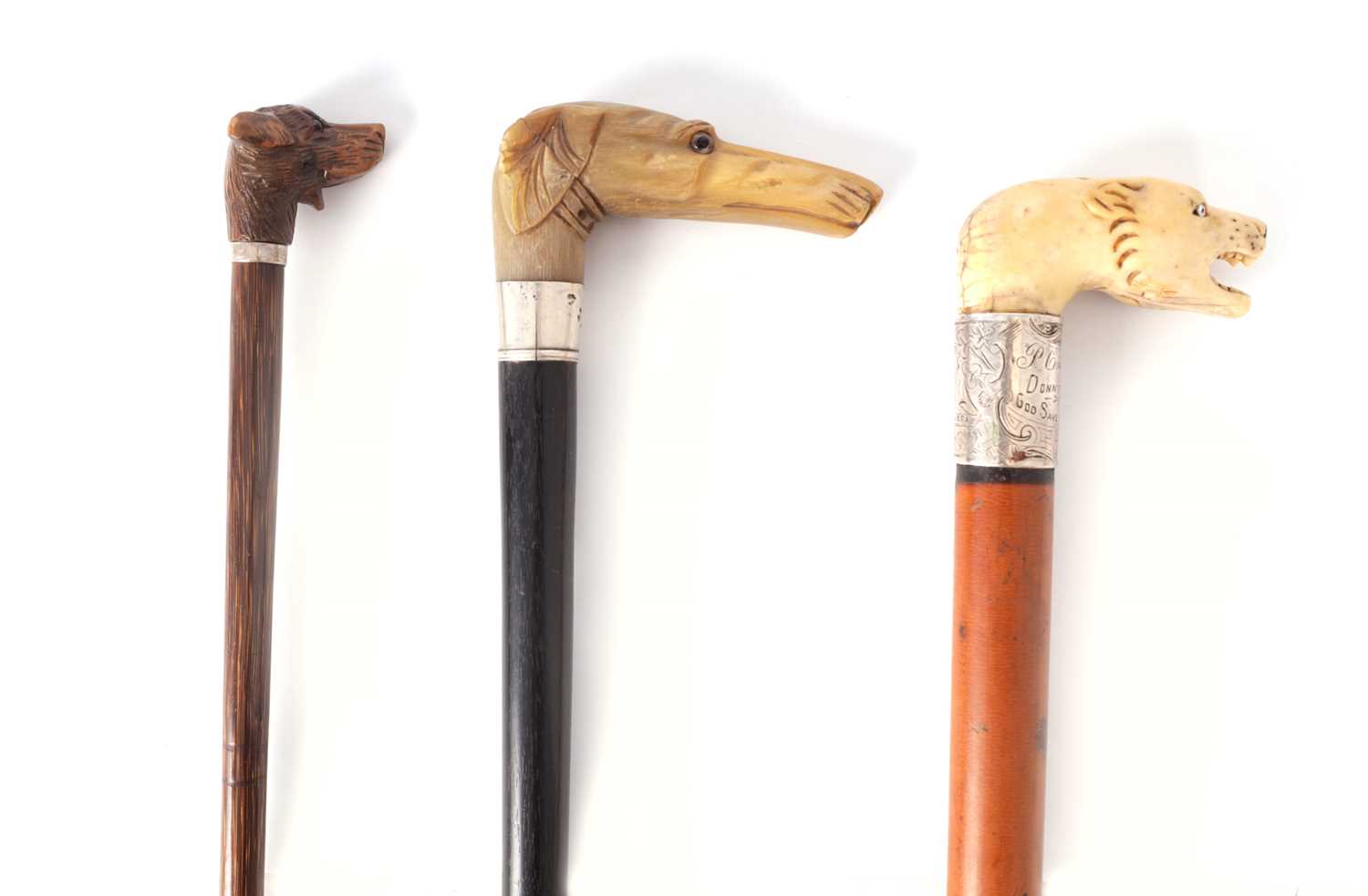 THREE 19TH CENTURY ANIMAL HEAD WALKING STICKS