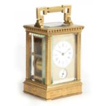 A LATE 19TH CENTURY FRENCH ENGRAVED BRASS REPEATING CARRAIGE CLOCK WITH ALARM