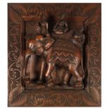 A LATE 19TH CENTURY CARVED INDIAN WALL PLAQUE