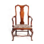 A GOOD GEORGE II WALNUT OPEN ARMCHAIR OF LARGE SIZE