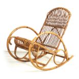 A 20TH CENTURY BAMBOO ROCKING CHAIR IN THE MANNER OF FRANCO ALBINI