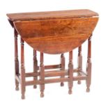A LATE 17TH CENTURY FRUITWOOD GATELEG TABLE OF SMALL SIZE
