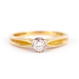 A LADIES 18CT GOLD DIAMOND SOLITAIRE RING
