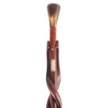 A 19TH CENTURY FOLK ART WALNUT WALKING STICK