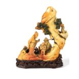 A FINLEY CARVED 19TH CENTURY CHINESE SOAPSTONE SCULPTURE ON HARDWOOD BASE