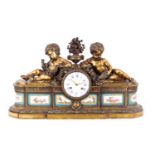 A LATE 19TH CENTURY FRENCH FIGURAL ORMOLU AND PORCELAIN PANELLED MANTEL CLOCK