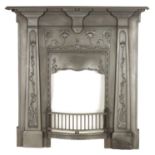 AN ART NOUVEAU CAST IRON FIRE SURROUND