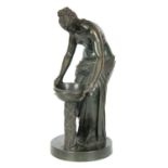 A 19TH CENTURY GREEN PATINATED GREEK-STYLE FIGURAL BRONZE SCULPTURE