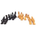 AN EARLY 20TH CENTURY STAUNTON PATTERN BOXWOOD AND EBONISED CHESS SET