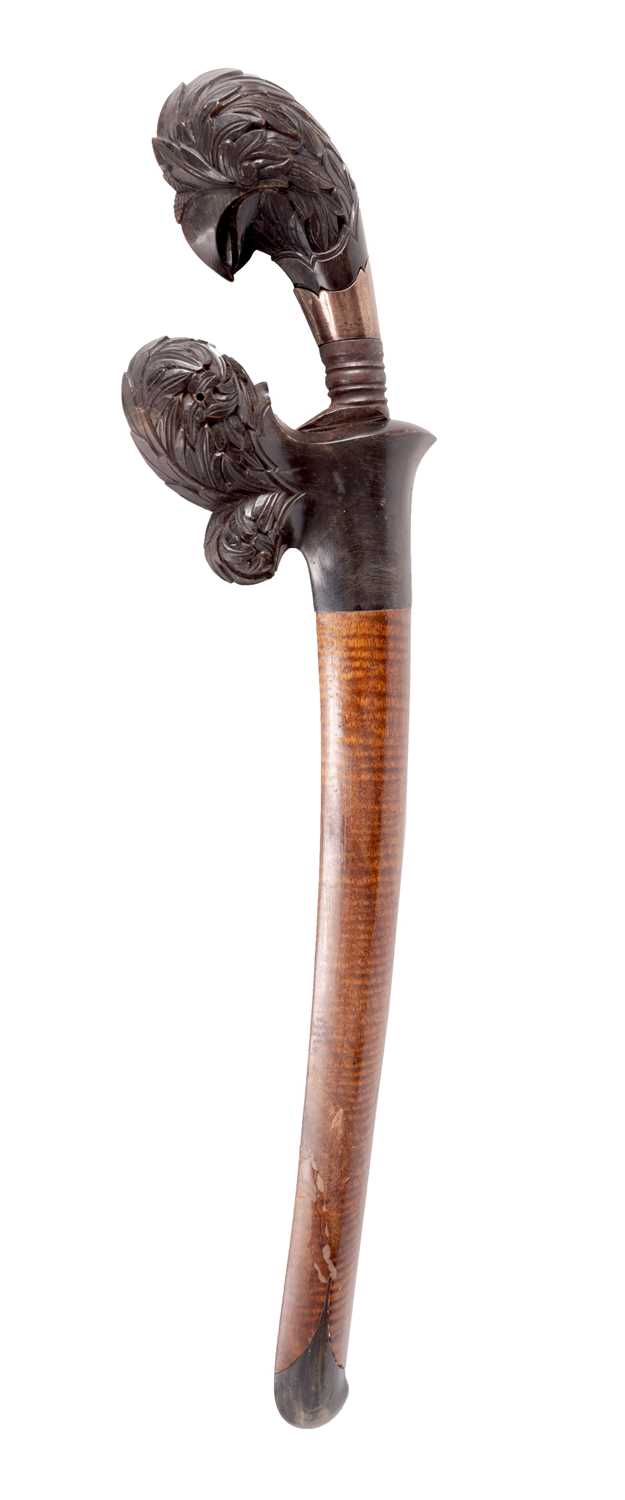 A 19TH CENTURY INDIAN CARVED HORN HANDLED KNIFE