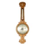 A 19TH CENTURY MOTHER OF PEARL INLAID ROSEWOOD WHEEL BAROMETER