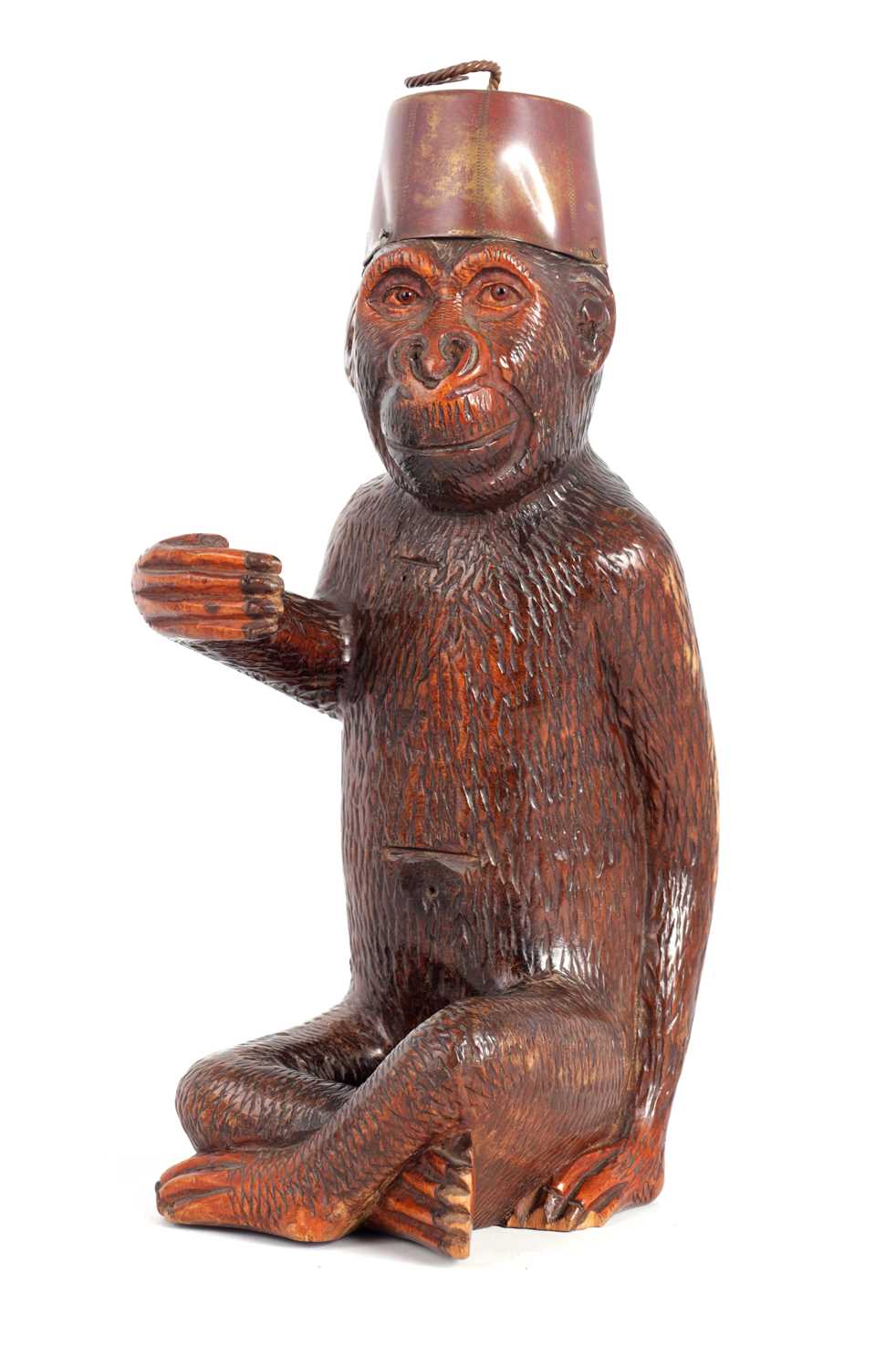 A 19TH CENTURY BLACK FOREST CARVED MONKEY