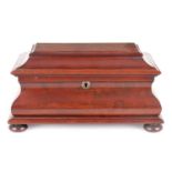 A FLAMED MAHOGANY SARCOPHAGUS SHAPED DOUBLE TEACADDY