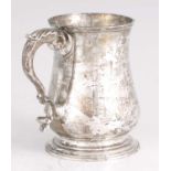 A GEORGE II SILVER TANKARD