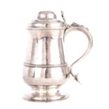 A GEORGE III PLAIN SILVER QUART TANKARD