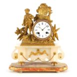 A LATE 19TH CENTURY FRENCH GILT METAL AND ONYX MANTEL CLOCK