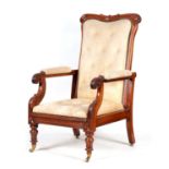 A REGENCY ROSEWOOD RECLINING LIBRARY ARMCHAIR