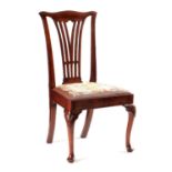 A GEORGE I WALNUT SIDE CHAIR