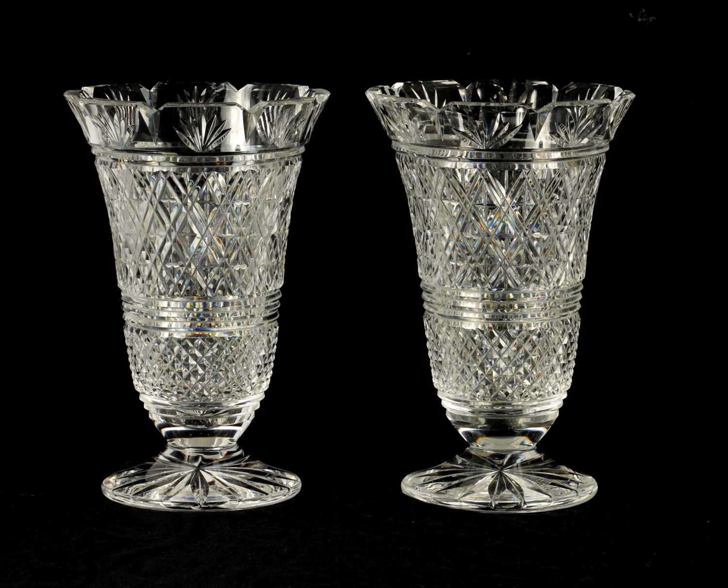 A GOOD PAIR OF WATERFORD CUT CRYSTAL TRUMPET-SHAPED FOOTED VASES