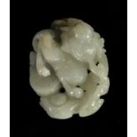 A CHINESE WHITE JADE CARVED AND PIERCED PENDANT